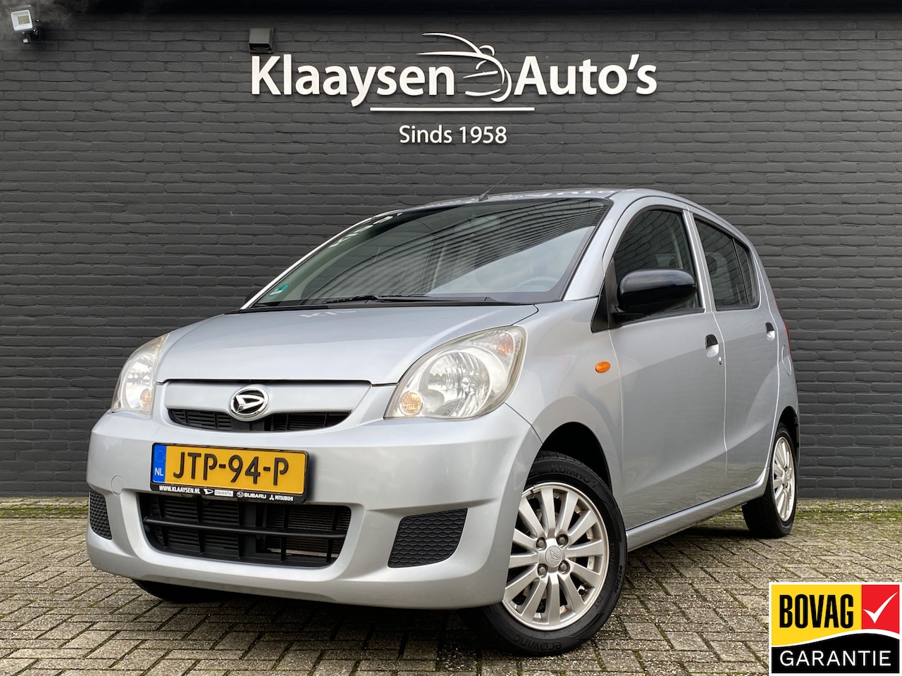 Daihatsu Cuore - 1.0 Comfort | airco | radio cd speler | lichtmetalen velgen | schuif-/kanteldak | centr. d - AutoWereld.nl