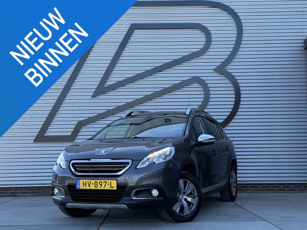 Peugeot 2008 - 1.2 PureTech Allure Navi|Pano|Clima|Trekhaak|Cruise|PDC|D-riem v.v. in 2022|N.A.P|APK tot - AutoWereld.nl