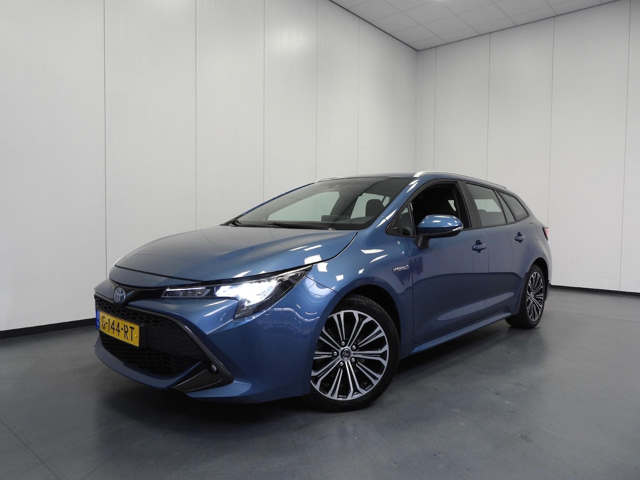 Toyota Corolla Touring Sports - 2.0 Hybrid Dynamic NAVI/CAMERA/CLIMA/17"LMV! - AutoWereld.nl