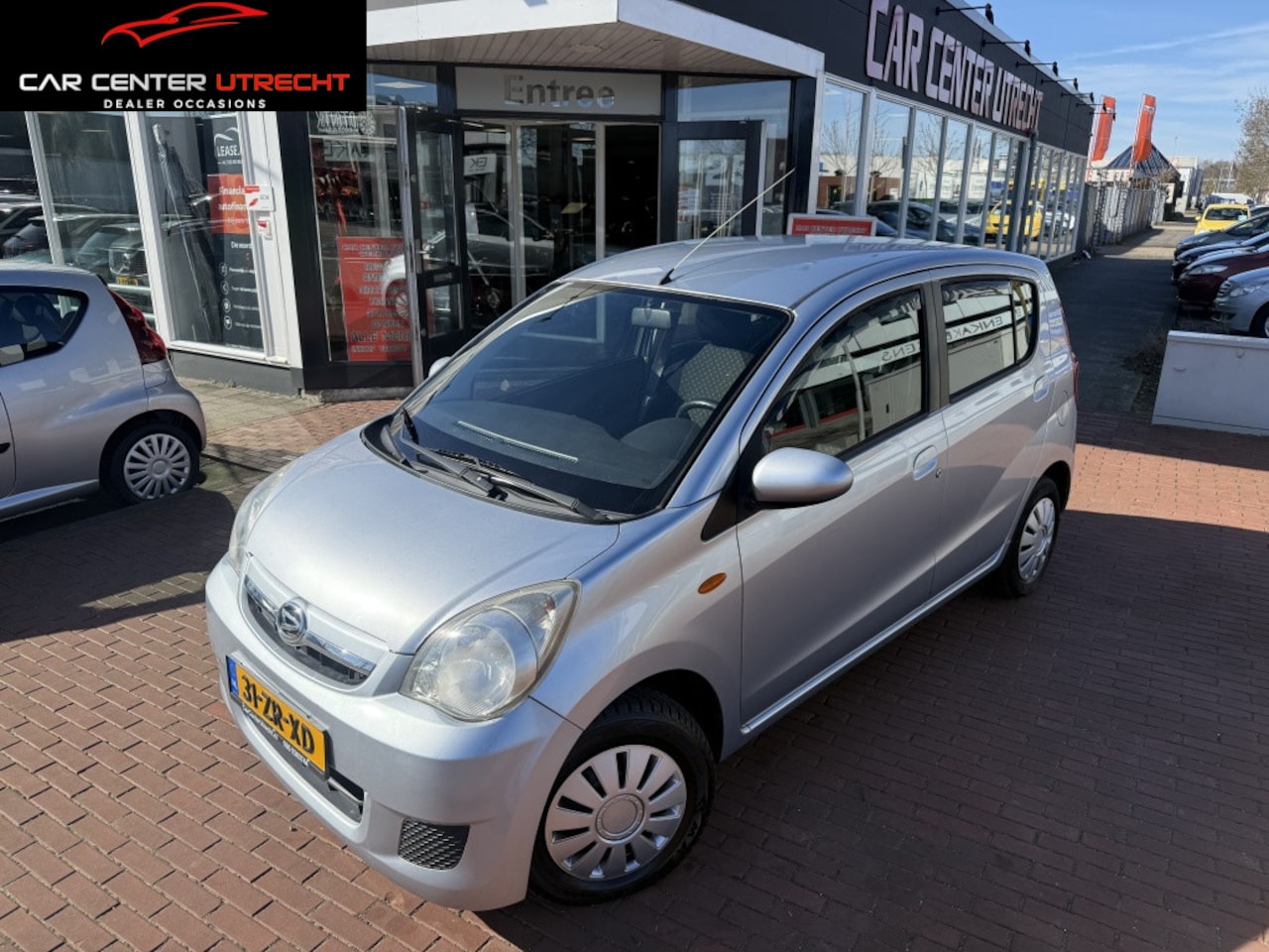 Daihatsu Cuore - 1.0 Premium 5drs airco zeer nette auto - AutoWereld.nl