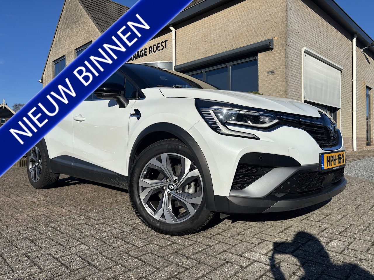 Renault Captur - 1.6 E-Tech Hybrid R.S. Line Automaat All-Seasons / Full LED / Camera - AutoWereld.nl