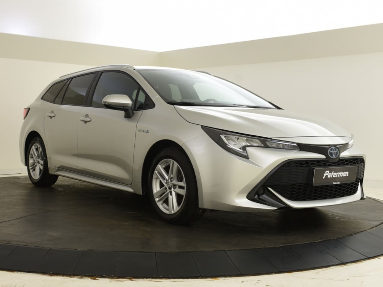 Toyota Corolla Touring Sports - 1.8 Hybrid Active | Head Up Display | Electr. Achterklep - AutoWereld.nl
