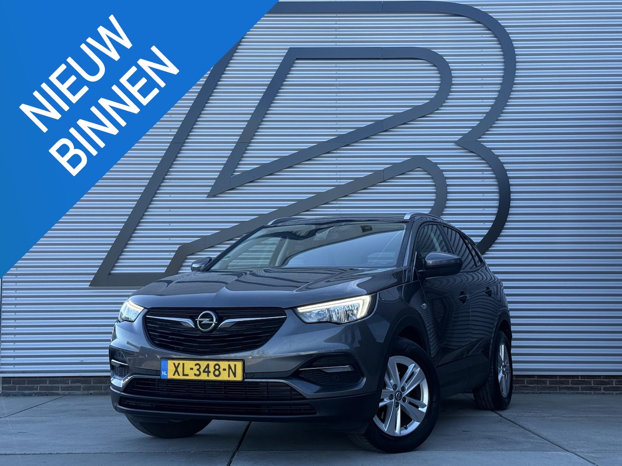Opel Grandland X - 1.2 Turbo Business + 2e Eigenaar|Navi|Camera|Trekhaak|D-riem v.v. in 2025|Clima|Cruise|Car - AutoWereld.nl
