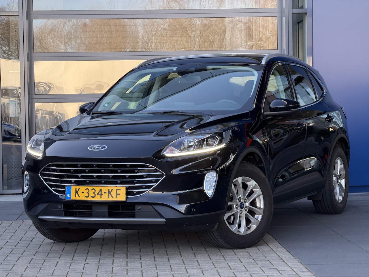 Ford Kuga - 1.5 EcoBoost Titanium | Trekhaak afn. | Winter Pack | Draadloze telefoonlader | Navi | Car - AutoWereld.nl