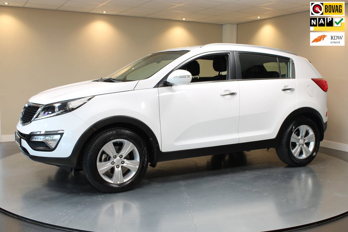 Kia Sportage - 1.6 GDI ComfortLine *Trekhaak* All-seasons|Camera|Navi|Cruise|NAP - AutoWereld.nl