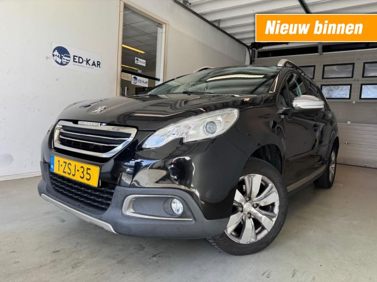 Peugeot 2008 - 1.2 PureTech Style CLIMA NAVI LMV PANORAMA NAP APK GOED ONDERHOUDEN - AutoWereld.nl