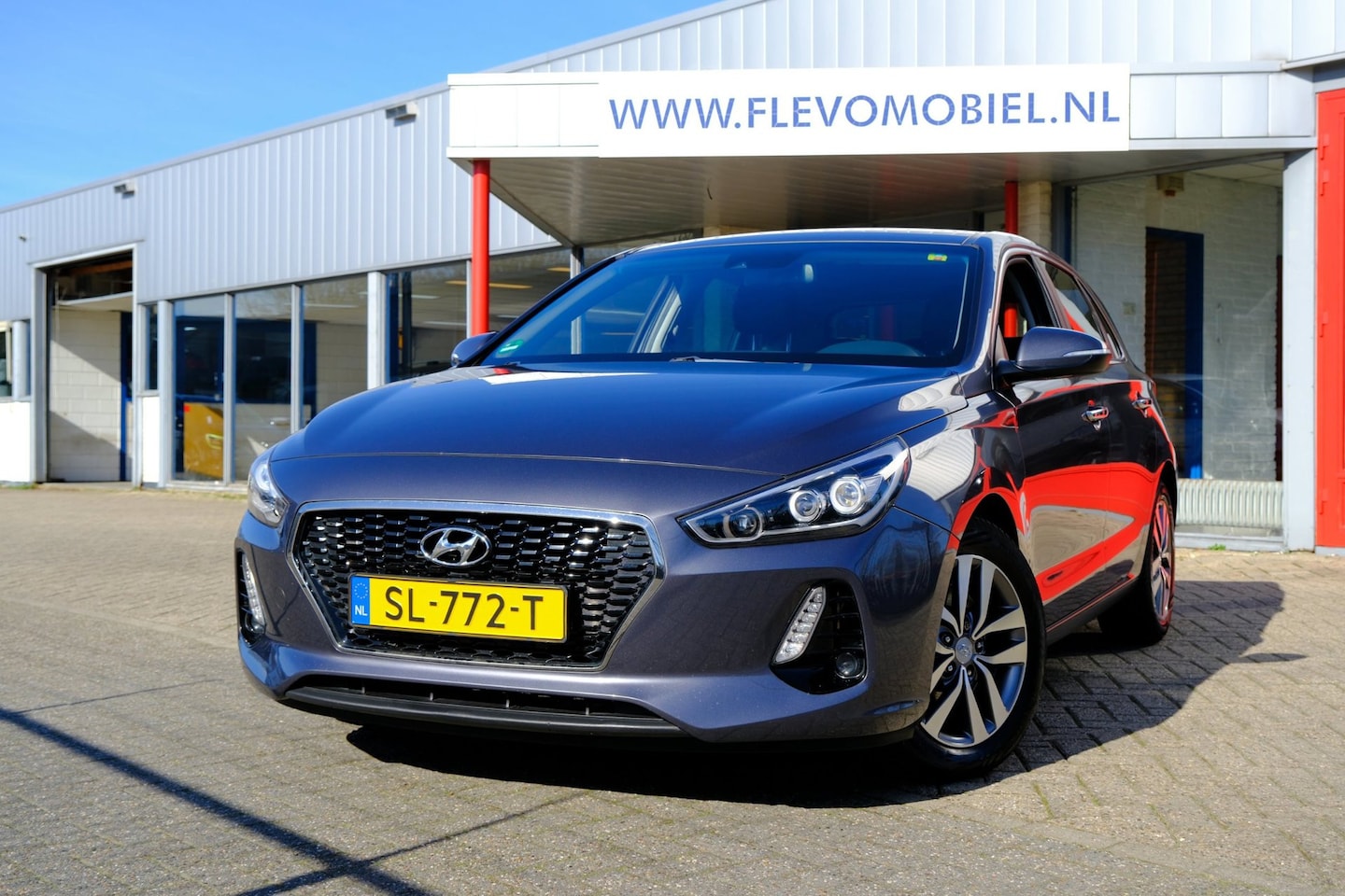 Hyundai i30 - 1.0 T-GDI Premium Navi|Half-Leder|Cruise|Trekhaak|Clima - AutoWereld.nl