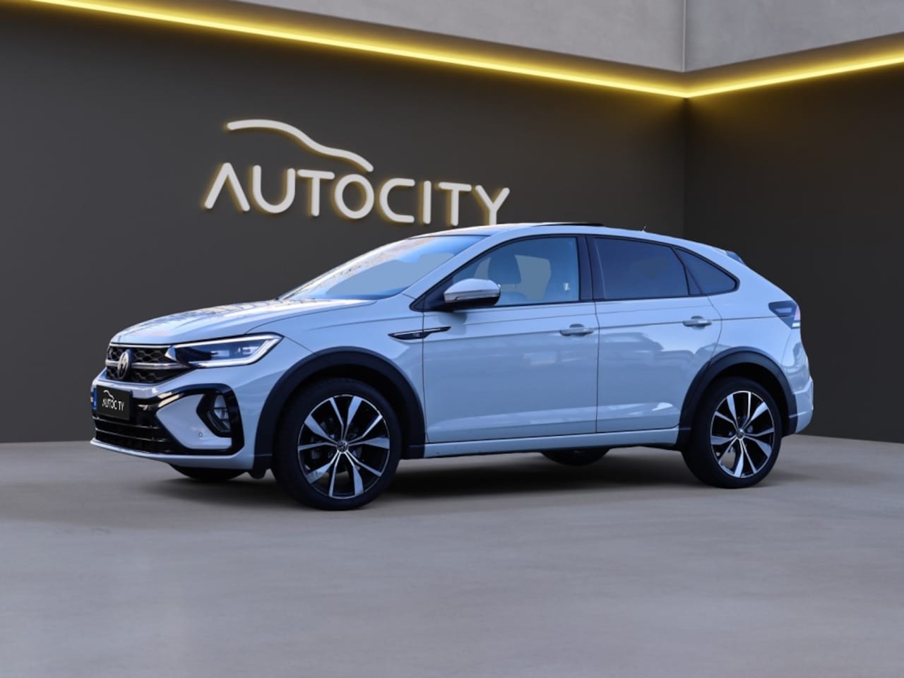 Volkswagen Taigo - R-Line 1.5 TSI DSG Pano l Adaptive l VOL OPTIE - AutoWereld.nl