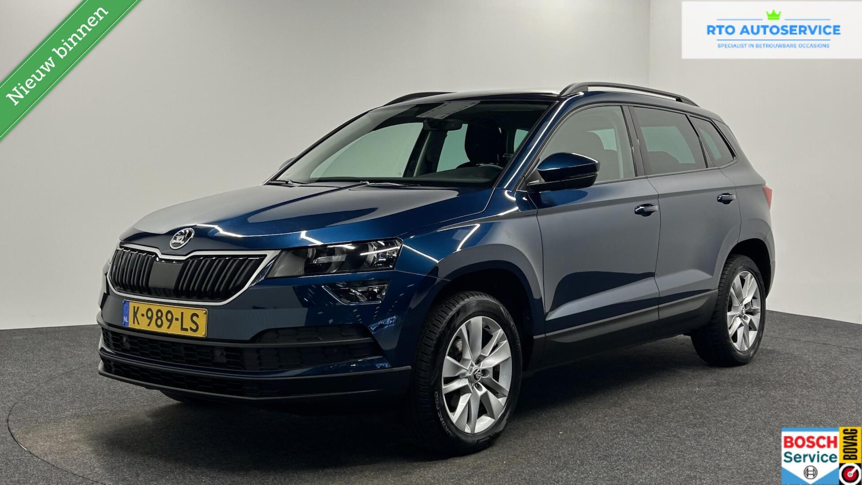 Skoda Karoq - 1.0 TSI Business Edition CARPLAY NAVI ECC CRUISE LM. - AutoWereld.nl