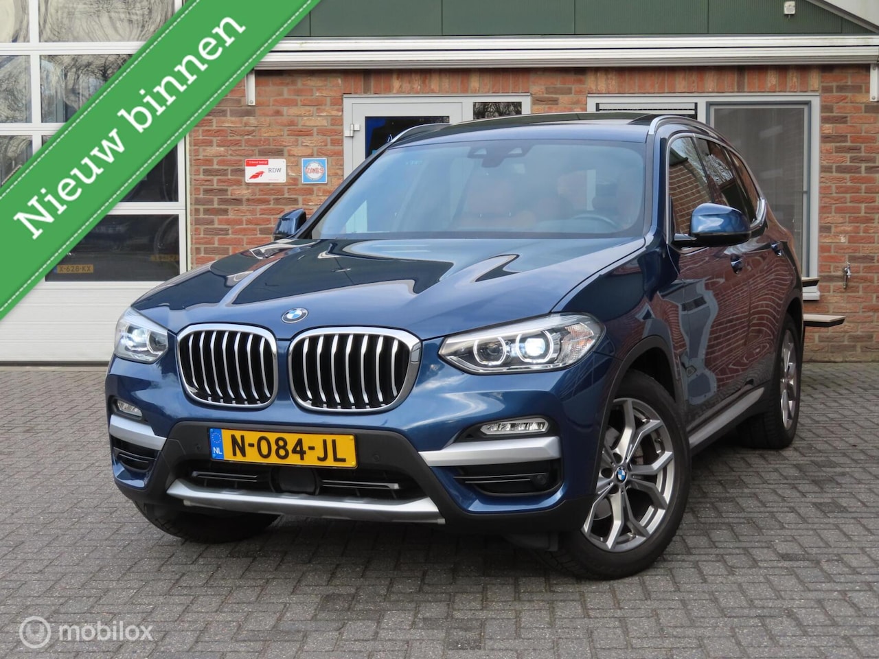 BMW X3 - xDrive20i High Executive|Leder|Pano|Wegklapbare trekhaak|HUD|Camera|Zwarte Hemel. - AutoWereld.nl