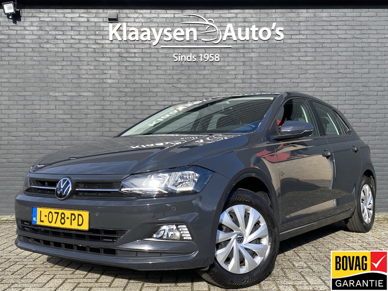 Volkswagen Polo - 1.0 TSI Comfortline Business | 1e eigenaar | dealer onderh. | navigatie | climate control - AutoWereld.nl