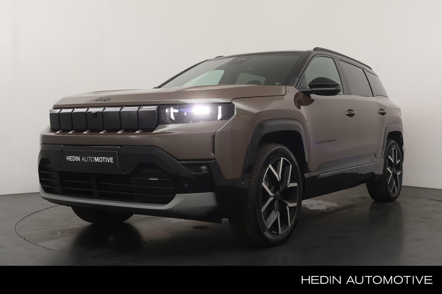Jeep Compass - First Edition 74 kWh | Schuif Kanteldak | Lederen bekleding | El. Achterklep | 20" LM Velg - AutoWereld.nl