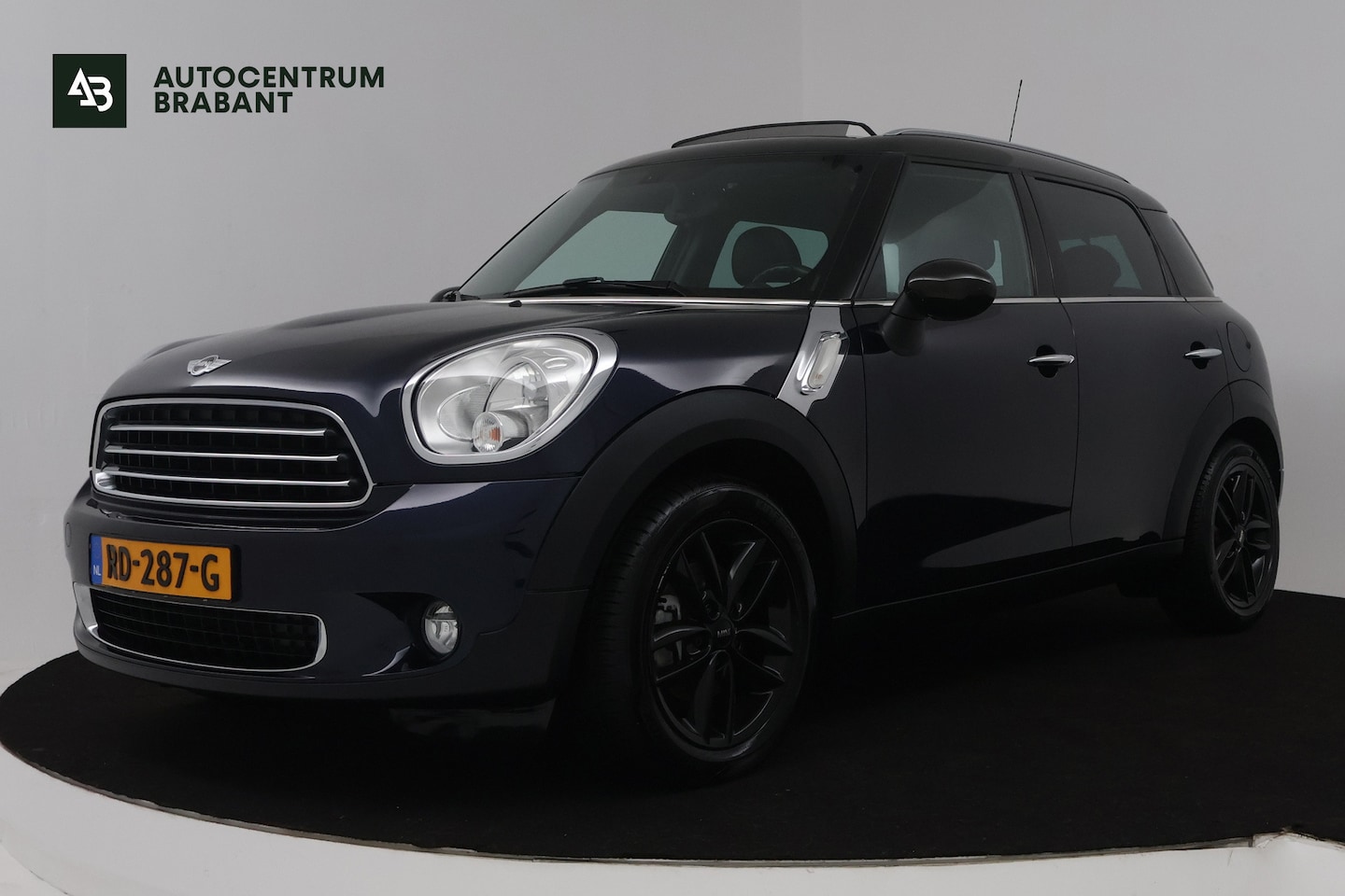 MINI Countryman - Mini 1.6 Cooper (PANORAMADAK, TREKHAAK, STOELVERWARMING, NAVIGATIE, CRUISE CONTROL) - AutoWereld.nl