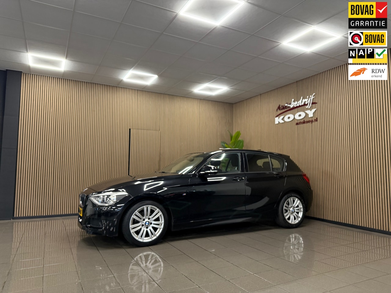 BMW 1-serie - 116i Executive M-Sport * Navigatie / Xenon / Cruise control / NL Auto * - AutoWereld.nl