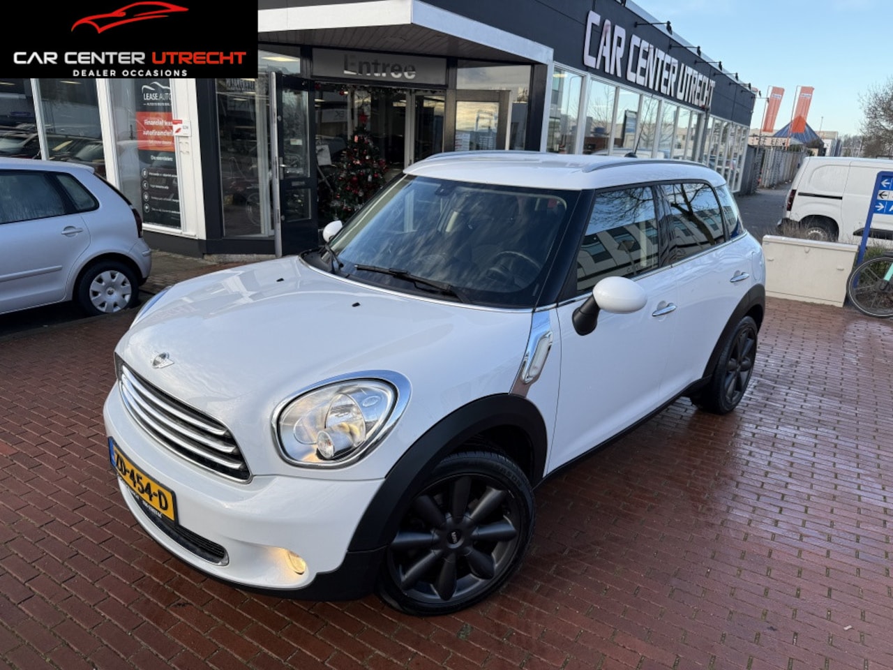 MINI Countryman - Mini 1.6 Cooper navi airco leer 6versn nette mini - AutoWereld.nl