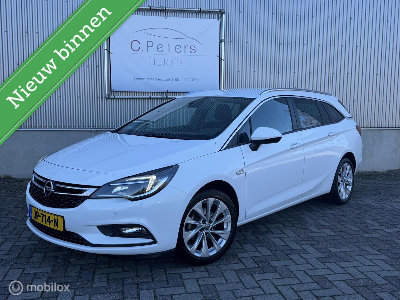 Opel Astra Sports Tourer - 1.0 Business+ 2016 / Navigatie / Carplay / PDC v+a / 17” / 2e eigenaar NAP - AutoWereld.nl