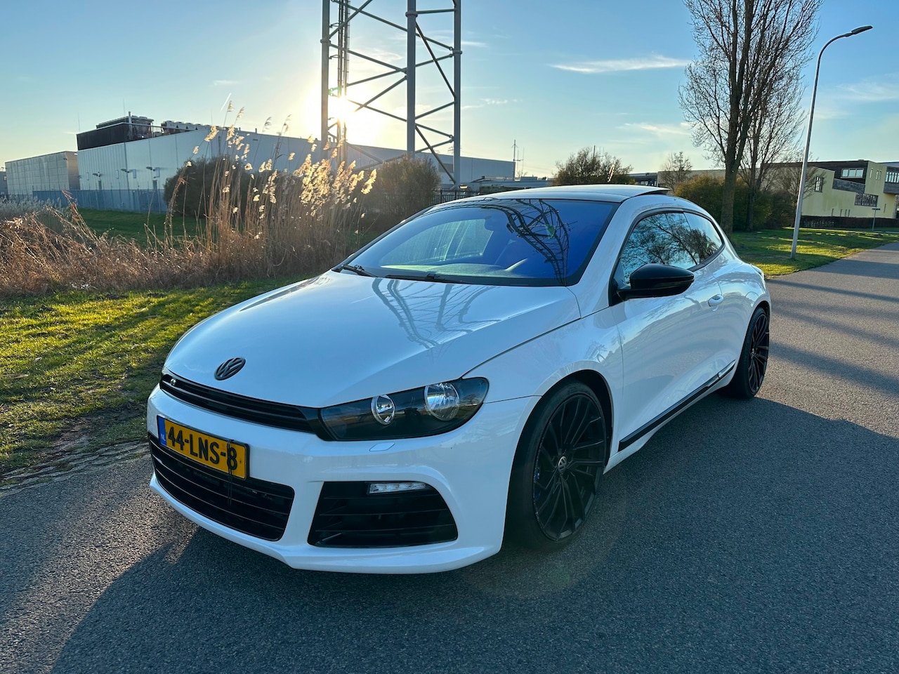 Volkswagen Scirocco - 1.4 TSI Highline Plus Panoramadak Navi Clima RTMG Tuning - AutoWereld.nl