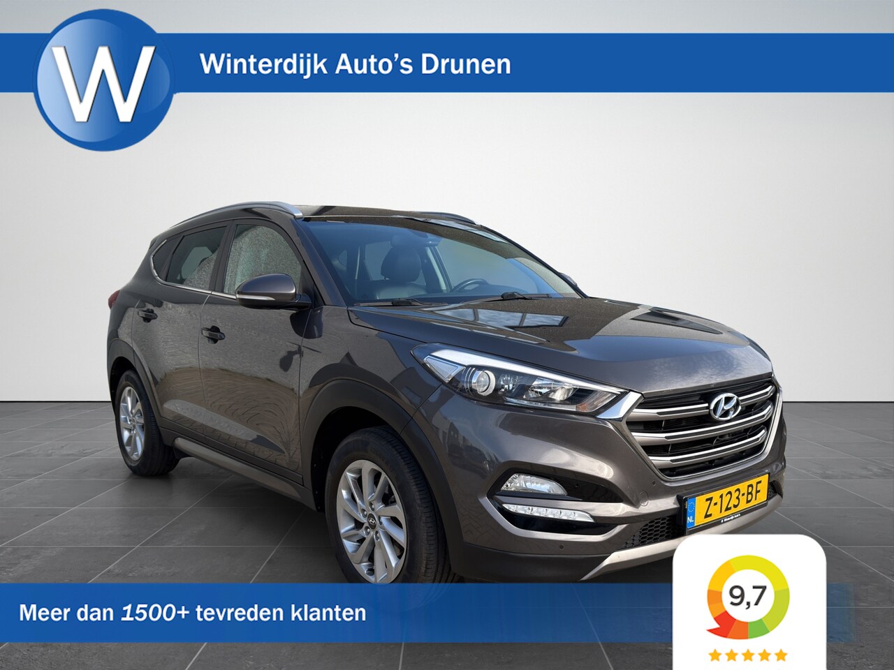 Hyundai Tucson - 1.6 GDi Comfort Clima|Cruise|Trekhaak|Navi - AutoWereld.nl