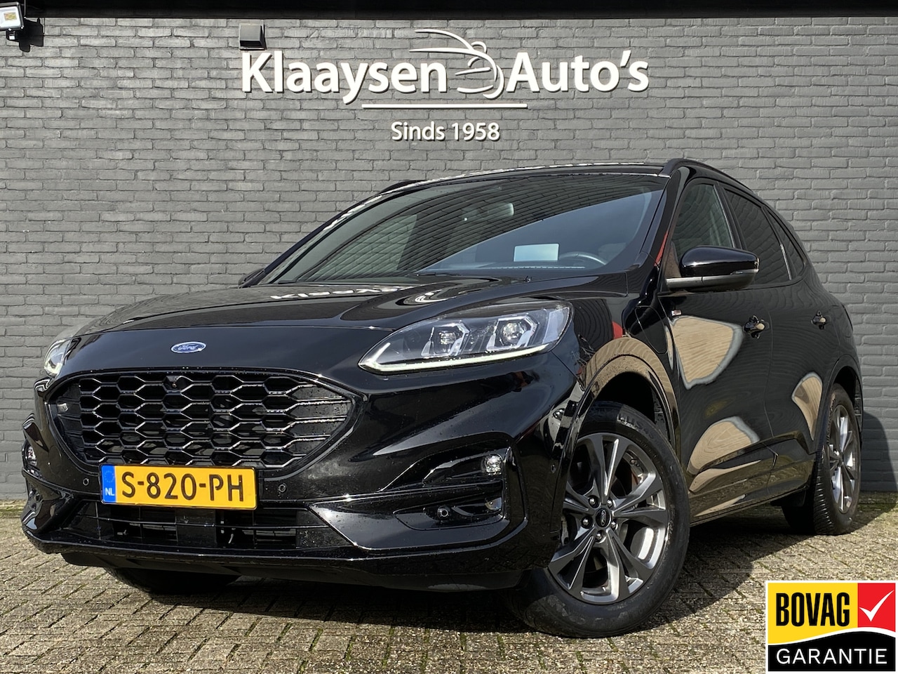 Ford Kuga - 2.5 PHEV 225 pk ST-Line X | dealer onderhouden | panoramadak | winterpakket | head up disp - AutoWereld.nl