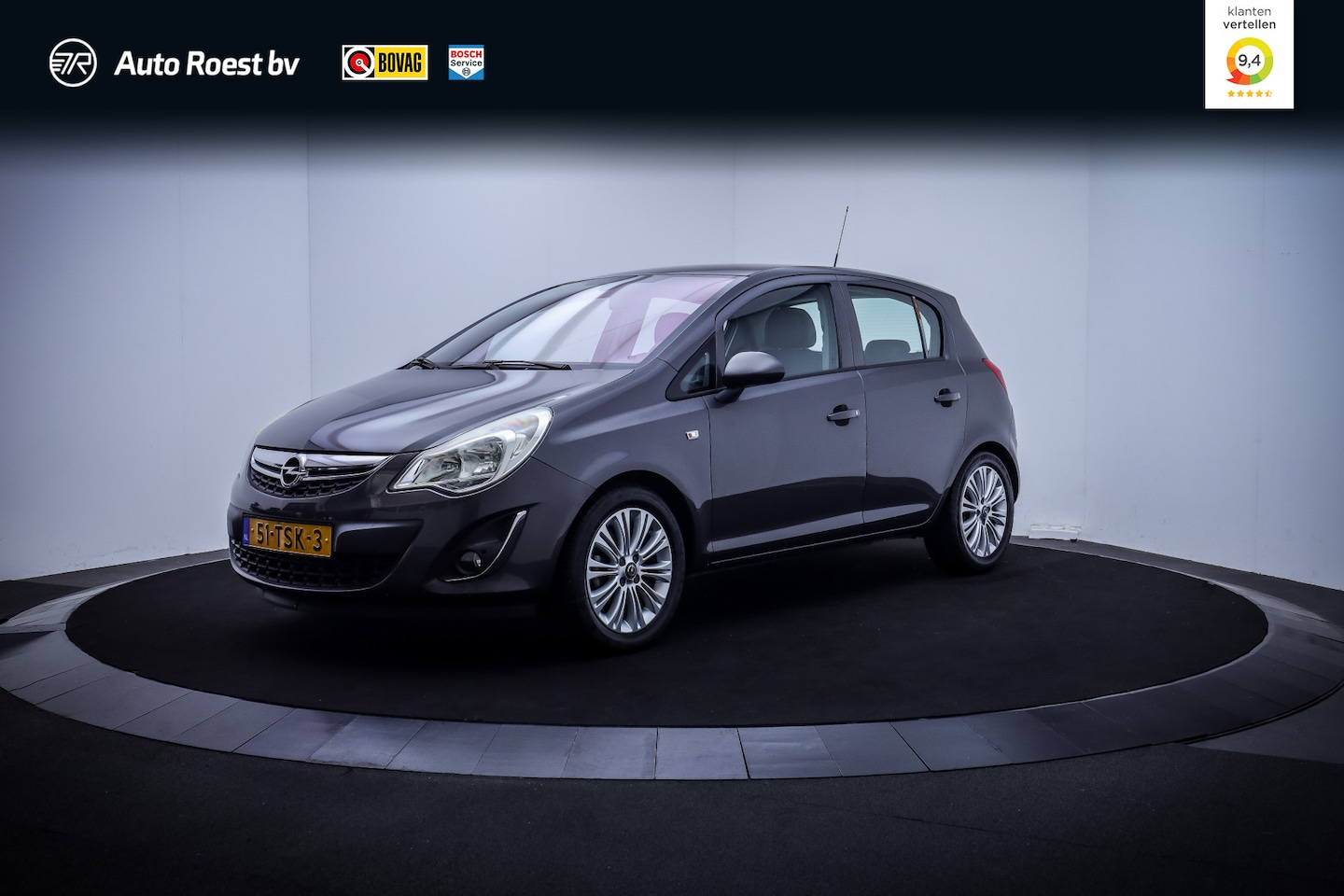 Opel Corsa - 1.4-16V Aut. COSMO 10d KM NAP! 1e EIG! NAVI | CLIMA | CRUISE | PDC | TREKH. AFN. | LMV | B - AutoWereld.nl