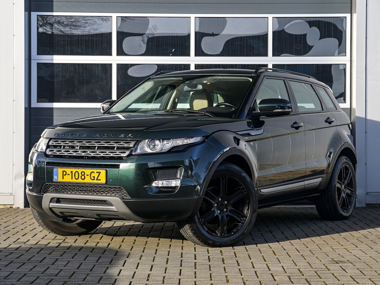 Land Rover Range Rover Evoque - 2.0 Si 4WD Prestige | Automaat | Leder | Xenon | Meridian audio | Stoelverwarming - AutoWereld.nl