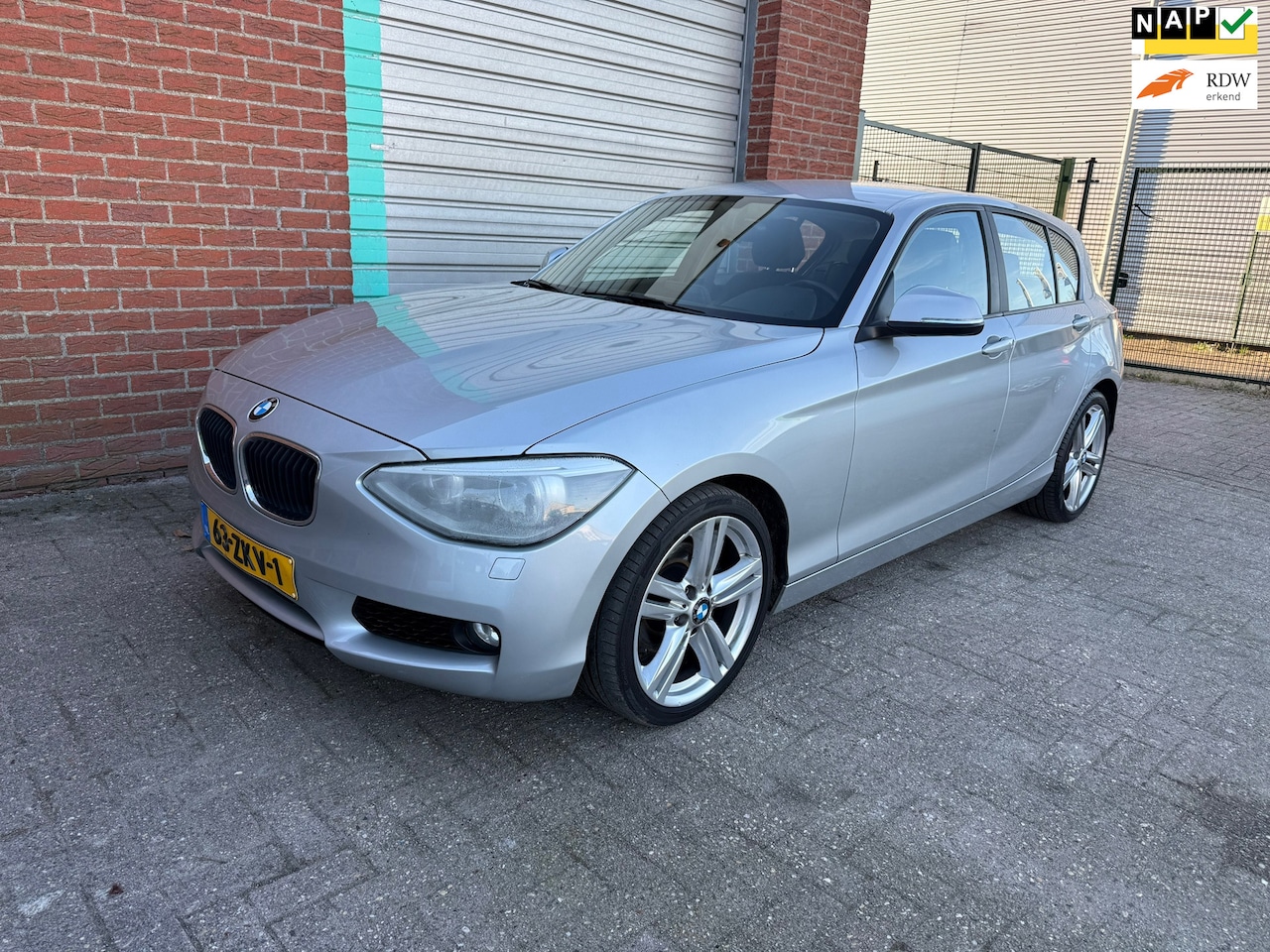 BMW 1-serie - 118i Upgrade Edition automaat NAV.+ Airco Bj:2012 NAP! - AutoWereld.nl