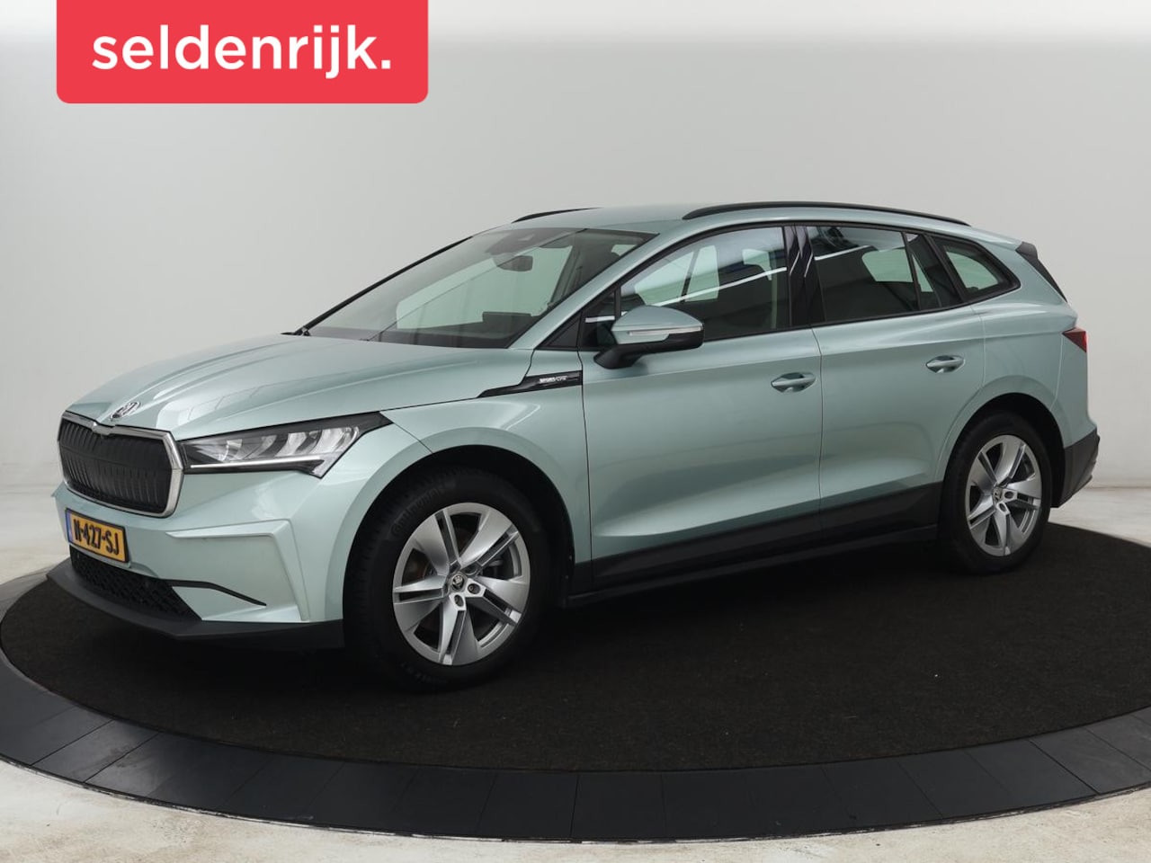 Skoda Enyaq iV - 60 | Trekhaak | Carplay | Camera | Half leder | Navigatie | Parkeerhulp | Sfeerverlichting - AutoWereld.nl