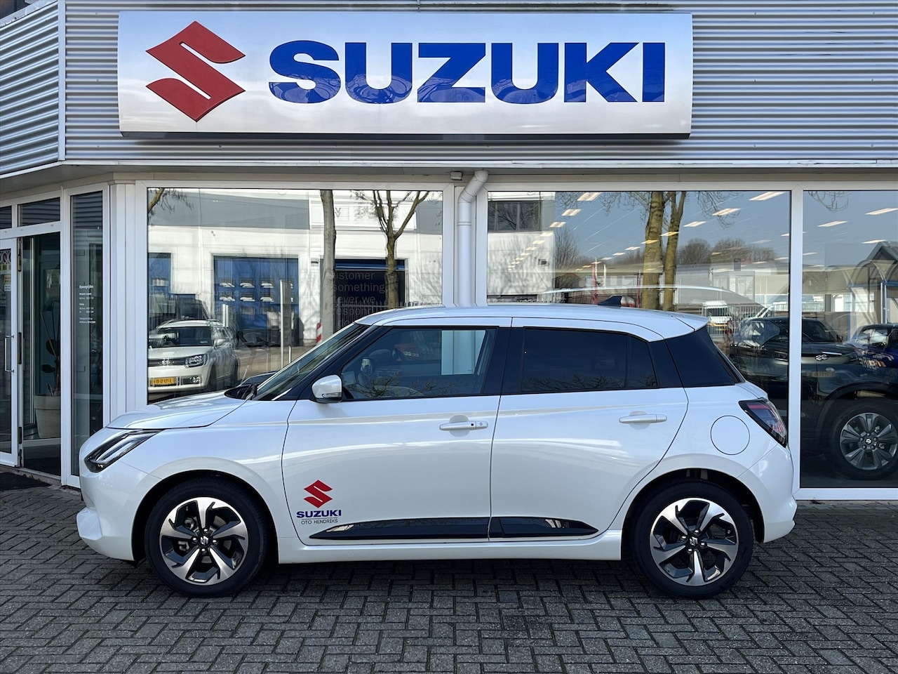 Suzuki Swift - 1.2 Smart Hybrid 83pk Style DEMO (RIJKLAARPRIJS) *Tot 10 Jaar Suzuki Garantie - AutoWereld.nl