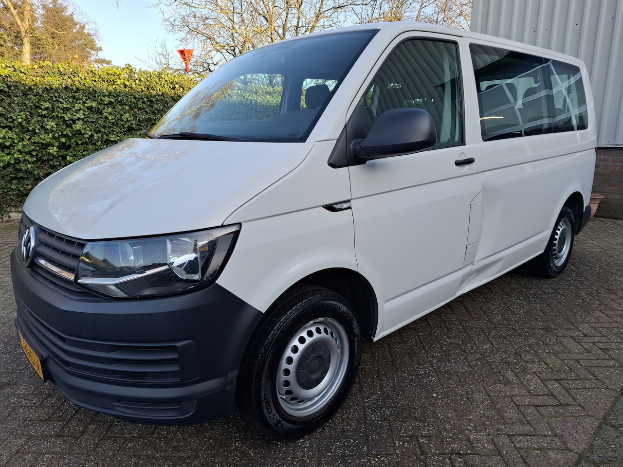 Volkswagen Transporter Kombi - 2.0 TDI L1H1 11495.- INCL BTW 9-PERSOONS EURO 6 84PK - AutoWereld.nl