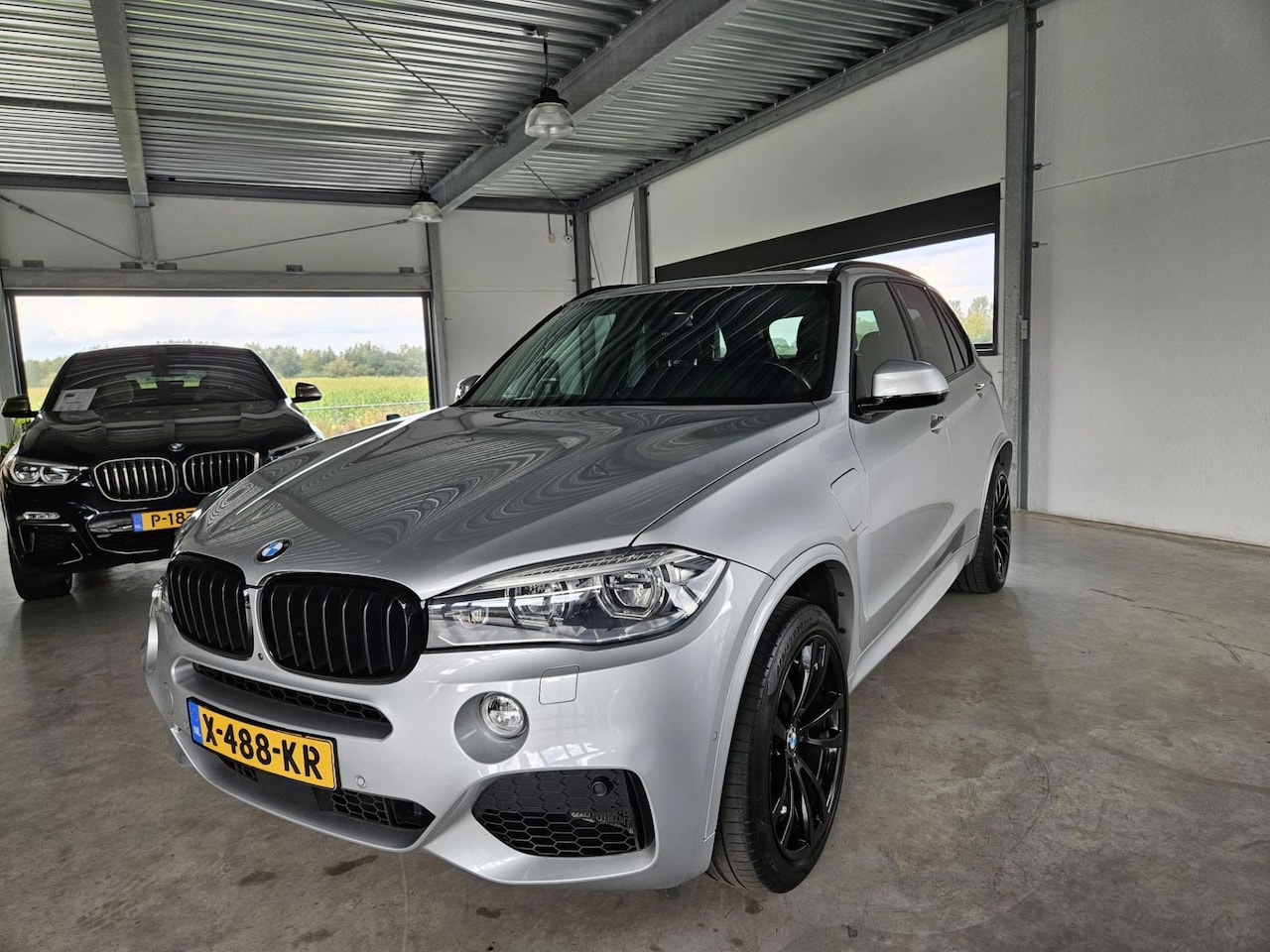 BMW X5 - XDrive40e iPerformance M Sport Ed. Trekhaak !! - AutoWereld.nl