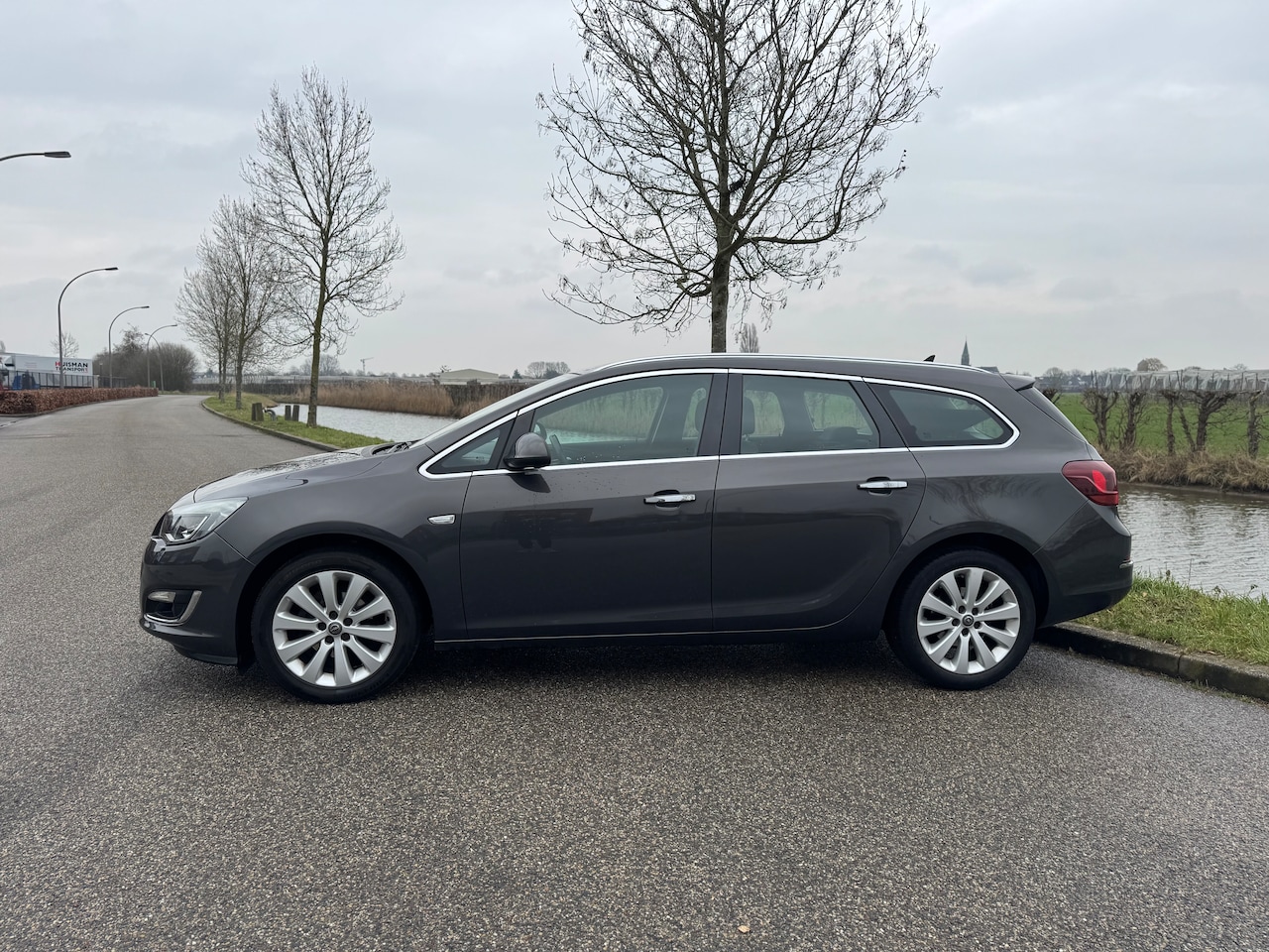 Opel Astra Sports Tourer - 1.4 Turbo Sport - AutoWereld.nl