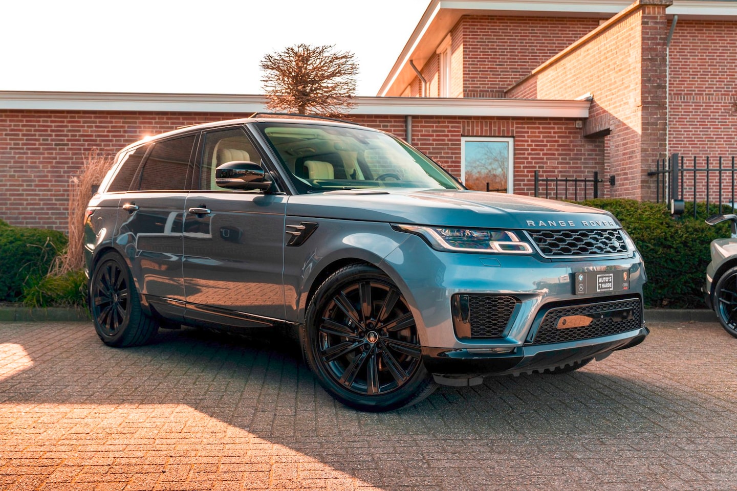 Land Rover Range Rover Sport - 2.0 P400e HSE Dynamic 404 PK Luchtvering Pano Keyless Trekhaak Meridian 360 Camera 22'' - AutoWereld.nl