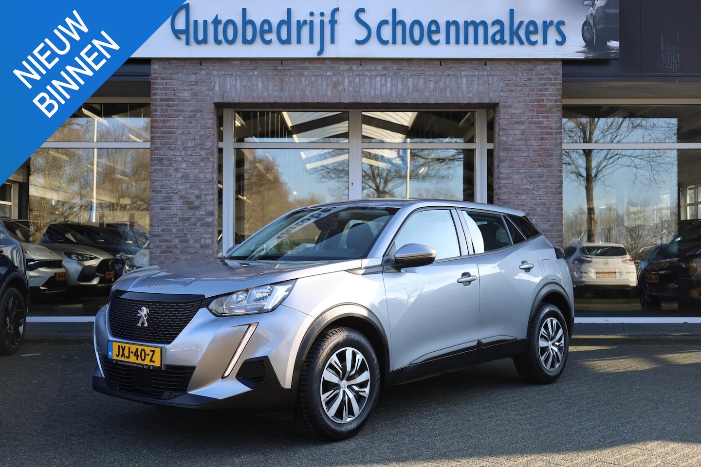 Peugeot 2008 - 1.2 PureTech Active CARPLAY STOELVERW. 360-CAMERA DAB CRUISE NAVI VOICE PDC - AutoWereld.nl