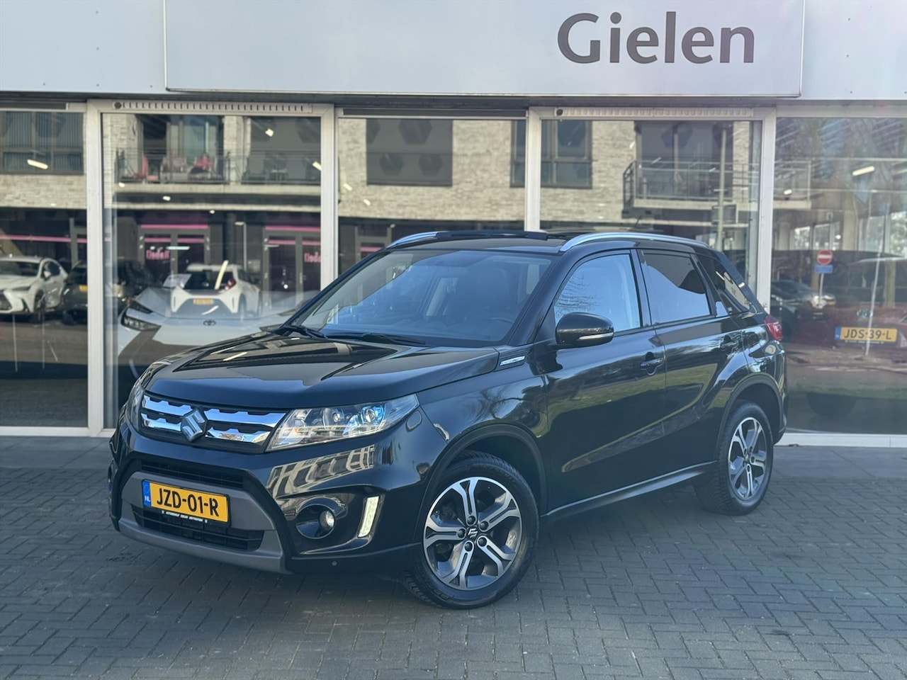 Suzuki Vitara - 1.6 VVT 120pk High Executive Automaat | Pano, Stoelverwarming, Navi, Adaptive cruise contr - AutoWereld.nl