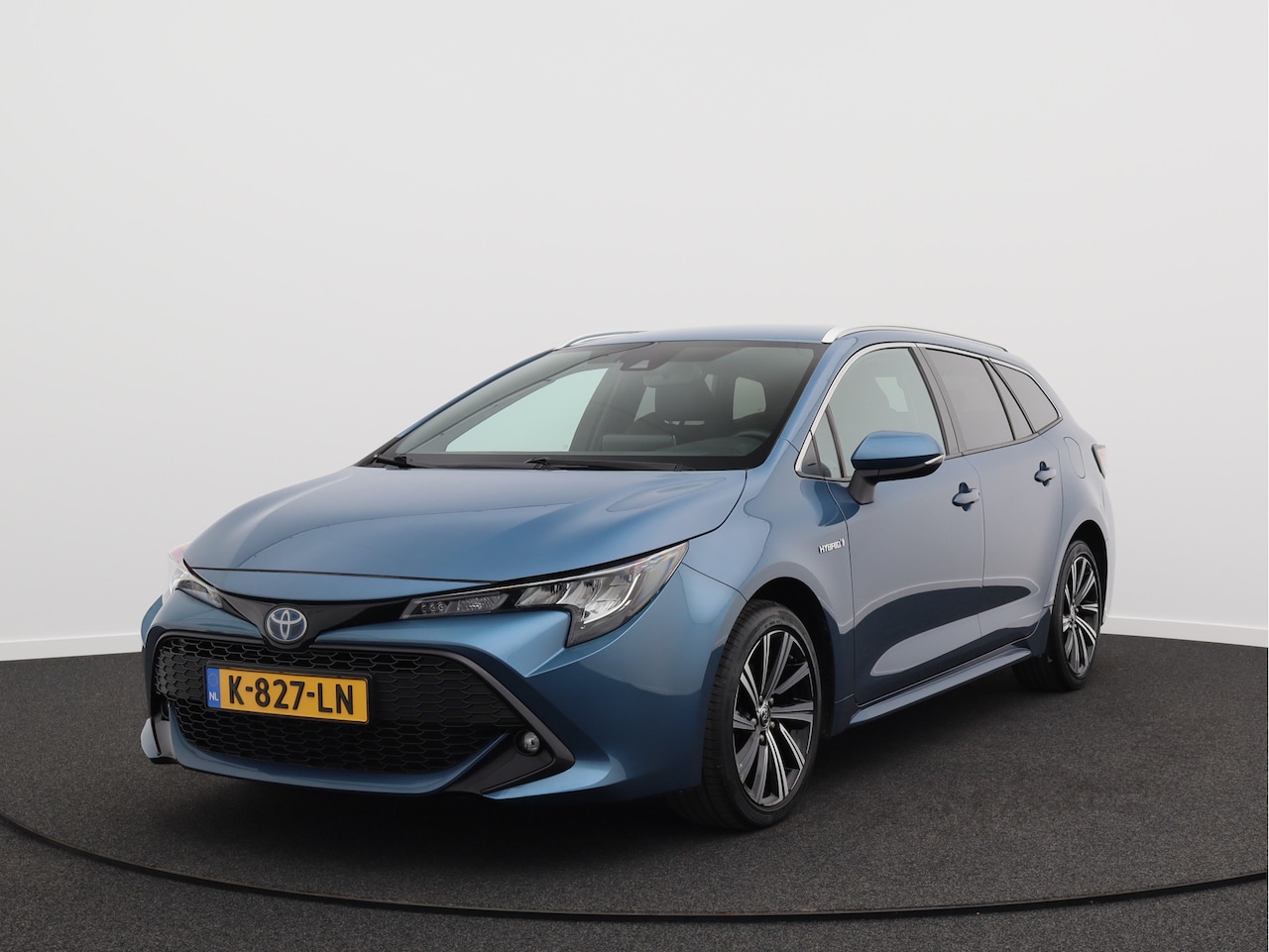 Toyota Corolla Touring Sports - 1.8 Hybrid Dynamic/ lage km/ trekhaak! - AutoWereld.nl