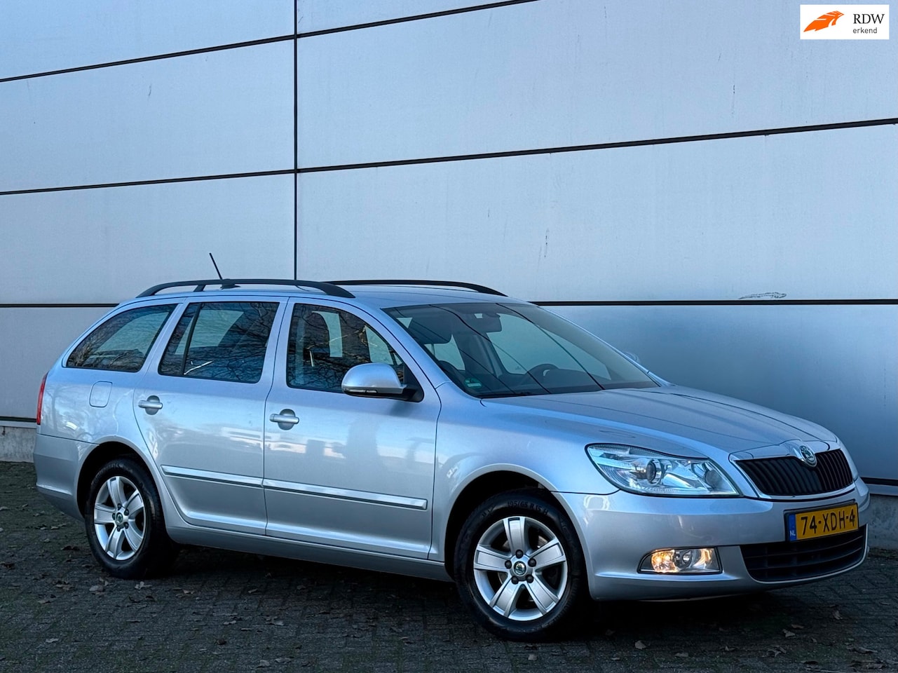 Skoda Octavia Combi - 1.2 TSI Ambition Business Line 2e Eignr |Xenon |Park Sensor |Navi |Airco |Trekhaak |Nap |B - AutoWereld.nl
