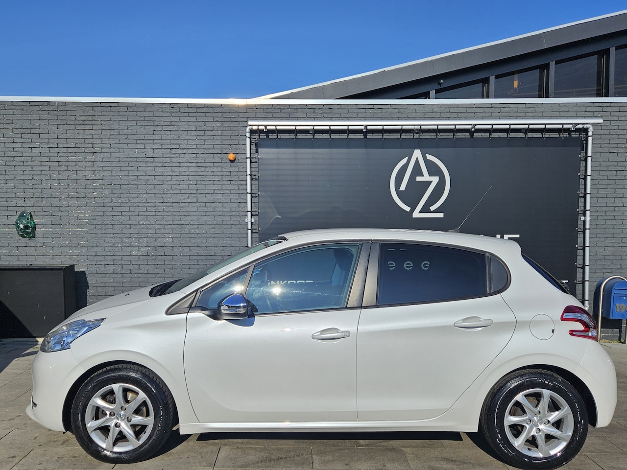 Peugeot 208 - 1.2 VTi Style *AC*Navi* - AutoWereld.nl