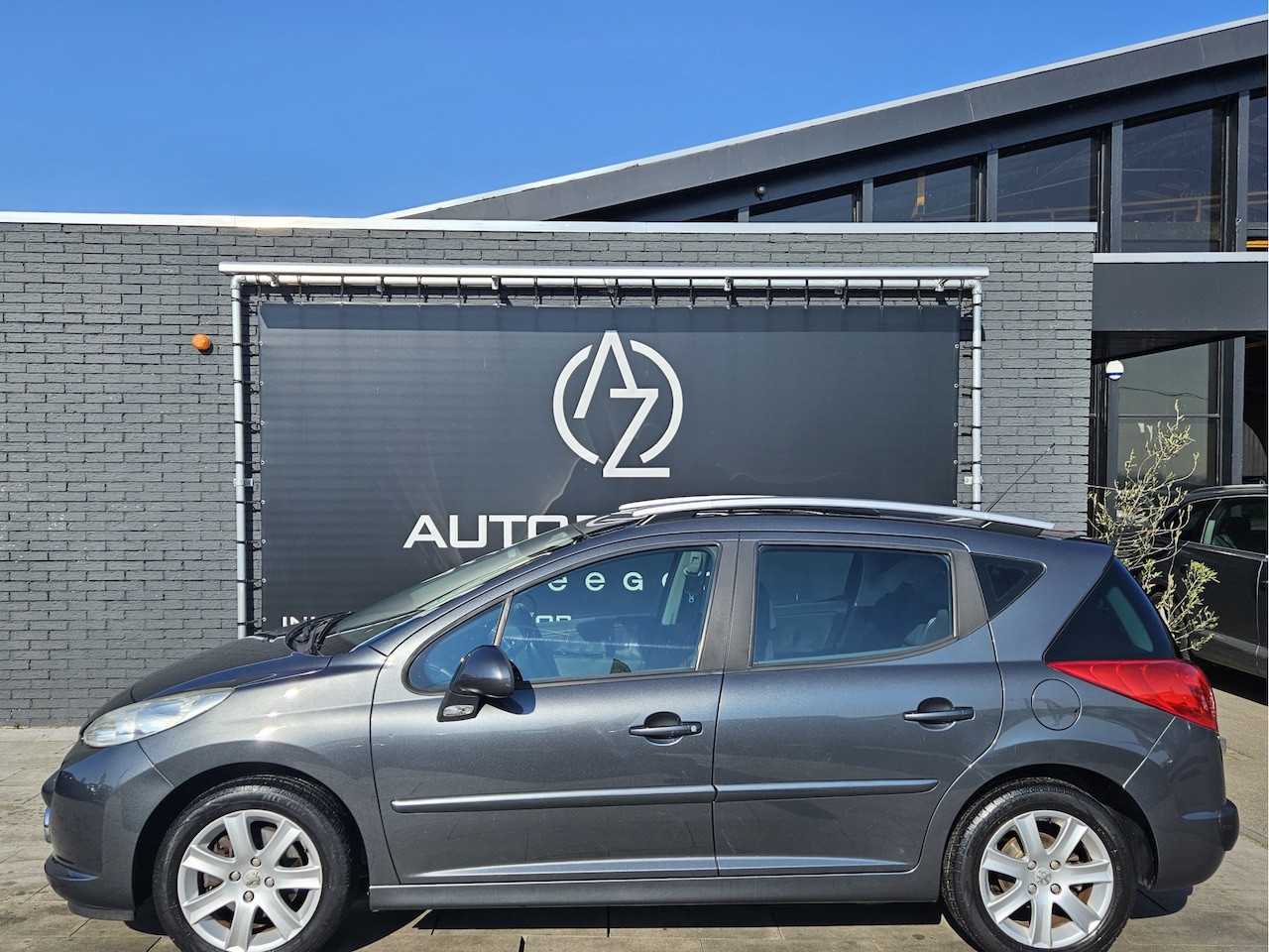 Peugeot 207 SW - 1.6 VTi XS Première *AC*CC*Pano* - AutoWereld.nl