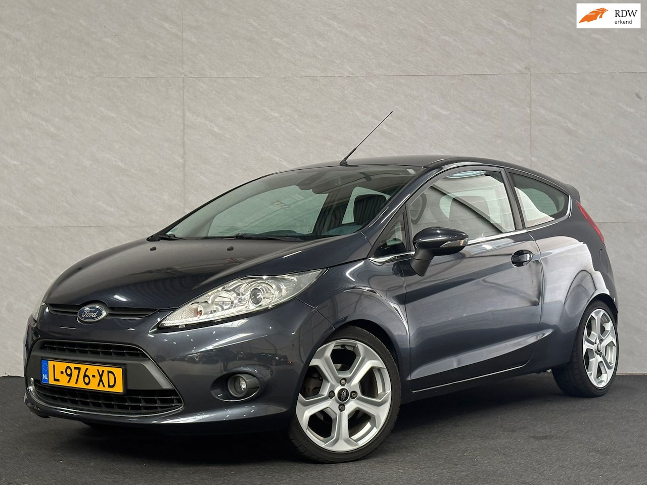 Ford Fiesta - 1.6 Ghia - Parkeersensoren - Cruisecontrol - - AutoWereld.nl