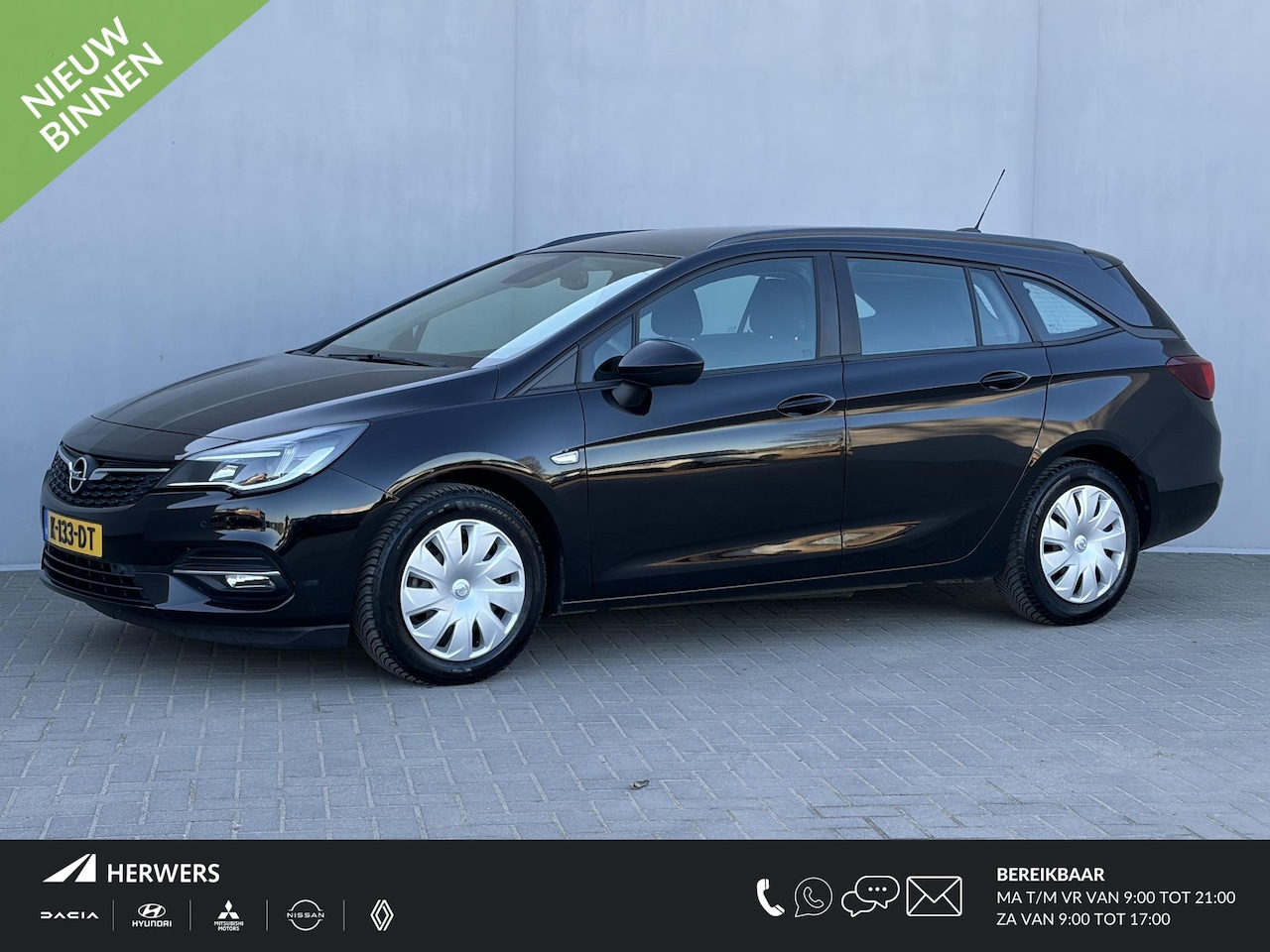 Opel Astra Sports Tourer - 1.2 Business Executive / Achteruitrijcamera / Navigatie /  Apple Carplay & Android Auto / - AutoWereld.nl