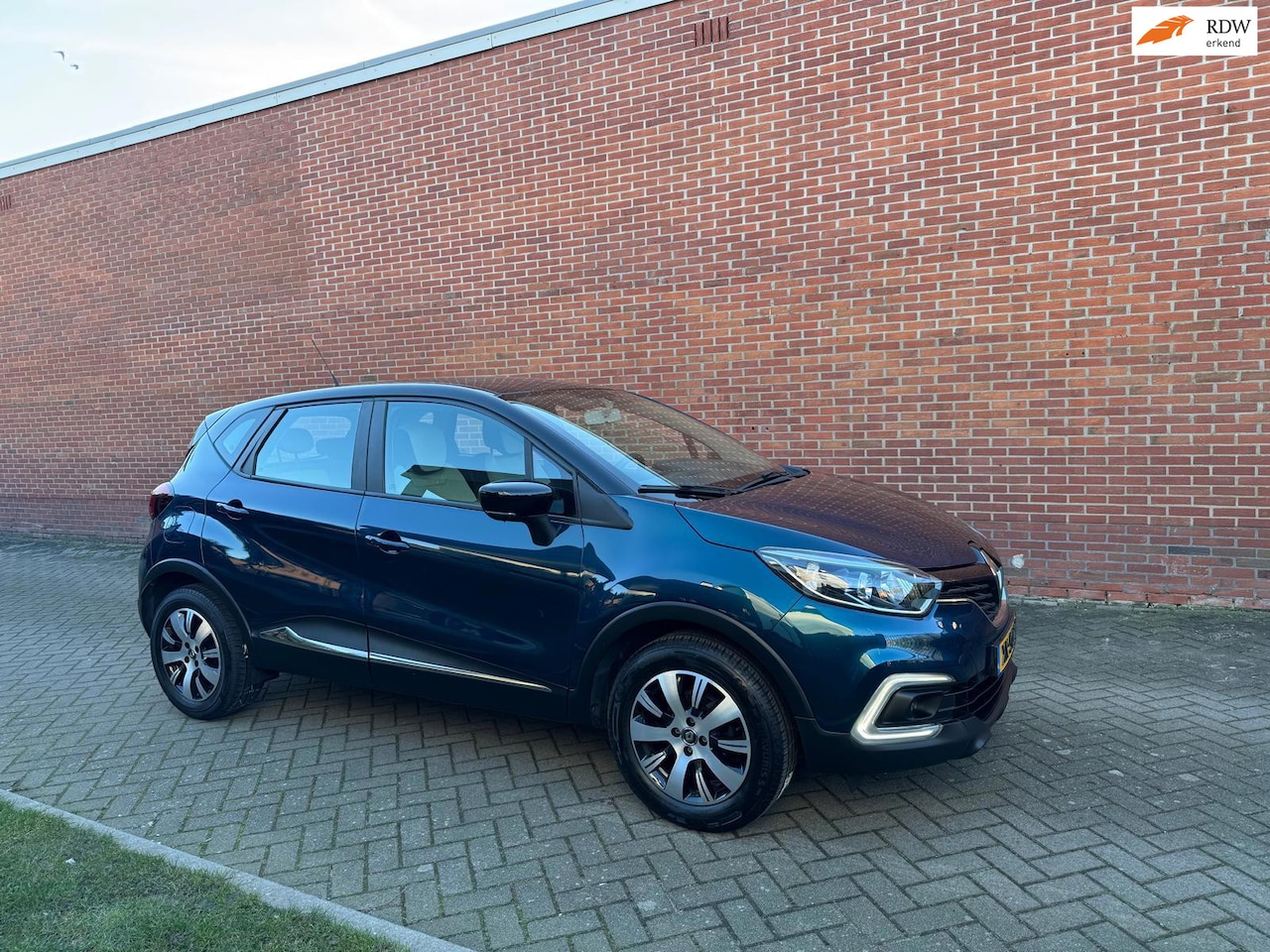 Renault Captur - 0.9 TCe Bose Navi Airco Cruise - AutoWereld.nl