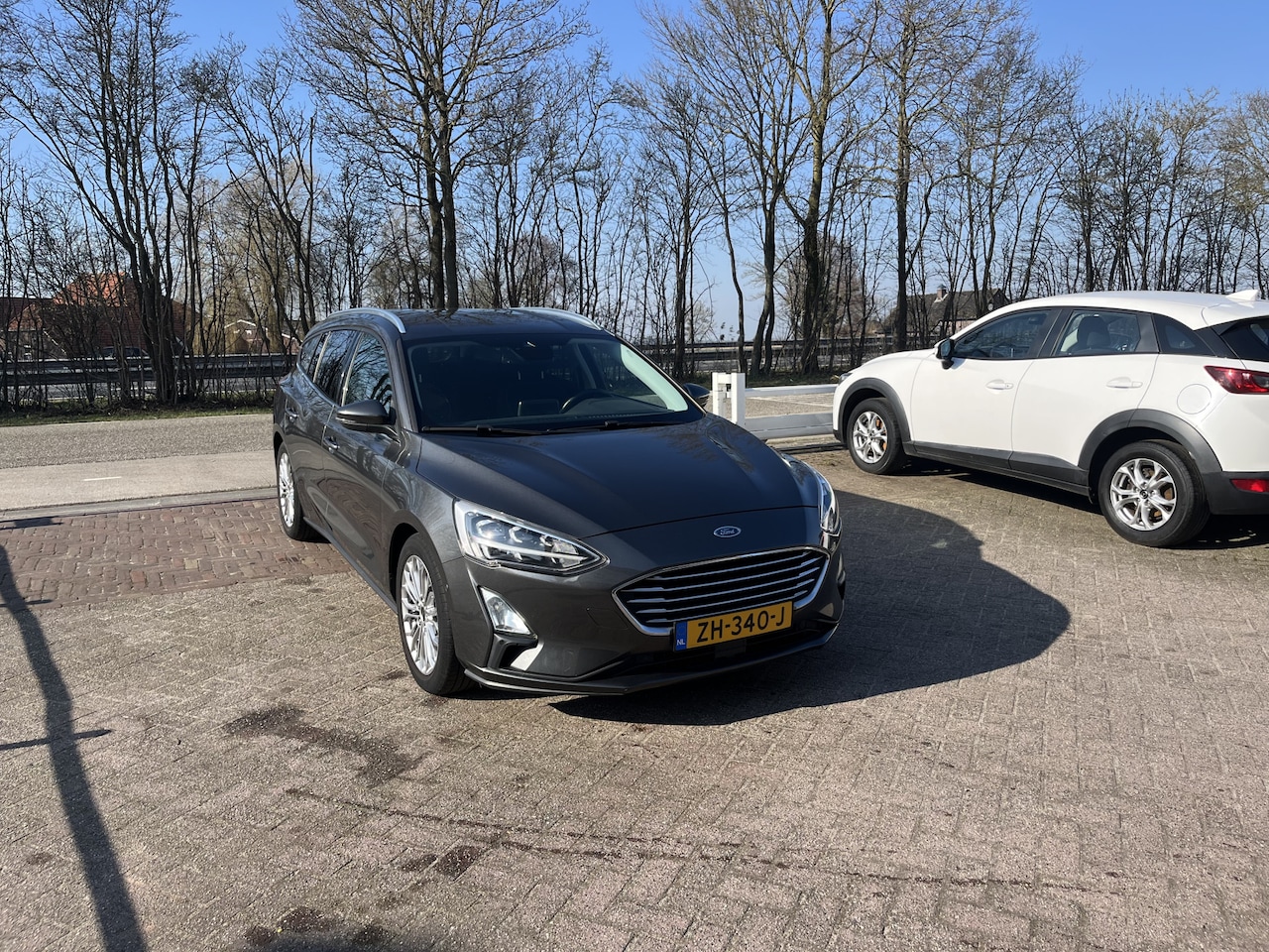 Ford Focus Wagon - 1.0 EcoBoost Titanium Business ADD CRUISE B&O CAMERA WINTER PACK - AutoWereld.nl