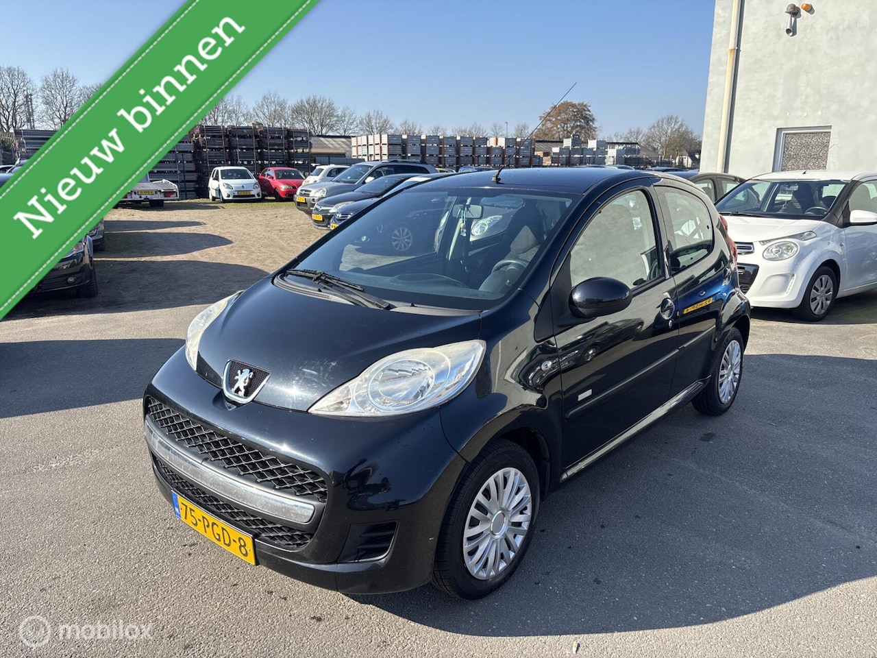 Peugeot 107 - 1.0-12V Millesim 200 2011 NIEUWE APK - AutoWereld.nl