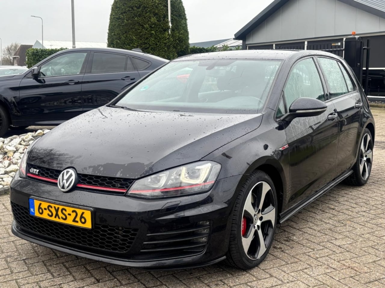 Volkswagen Golf - 7 2.0 GTI Performance 230PK 5-Deurs 2014 Zwart NL Auto - AutoWereld.nl