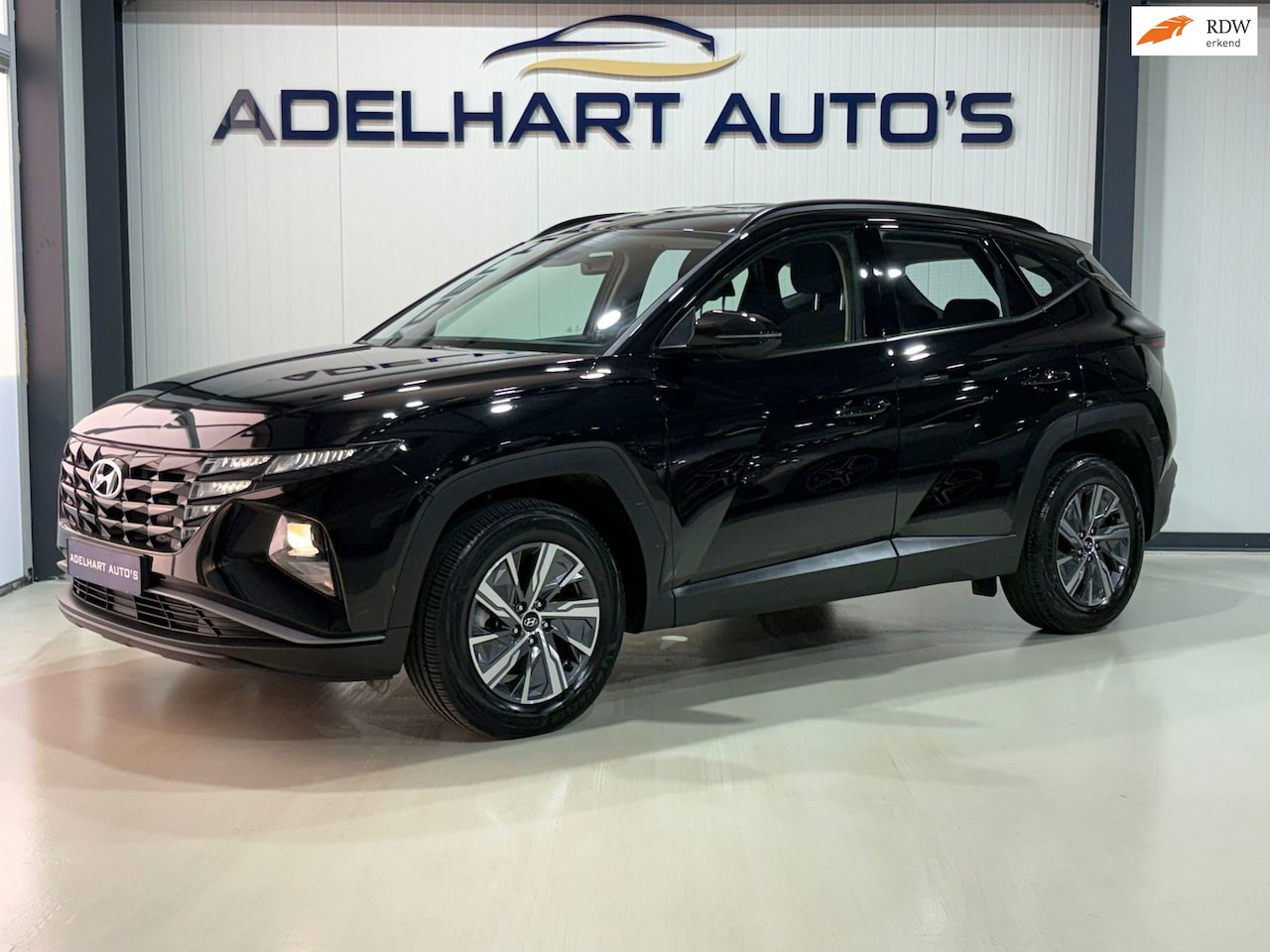 Hyundai Tucson - 1.6 T-GDI HEV Comfort 230 PK Automaat / Navigatie full map / Camera / Cruise control / Cli - AutoWereld.nl