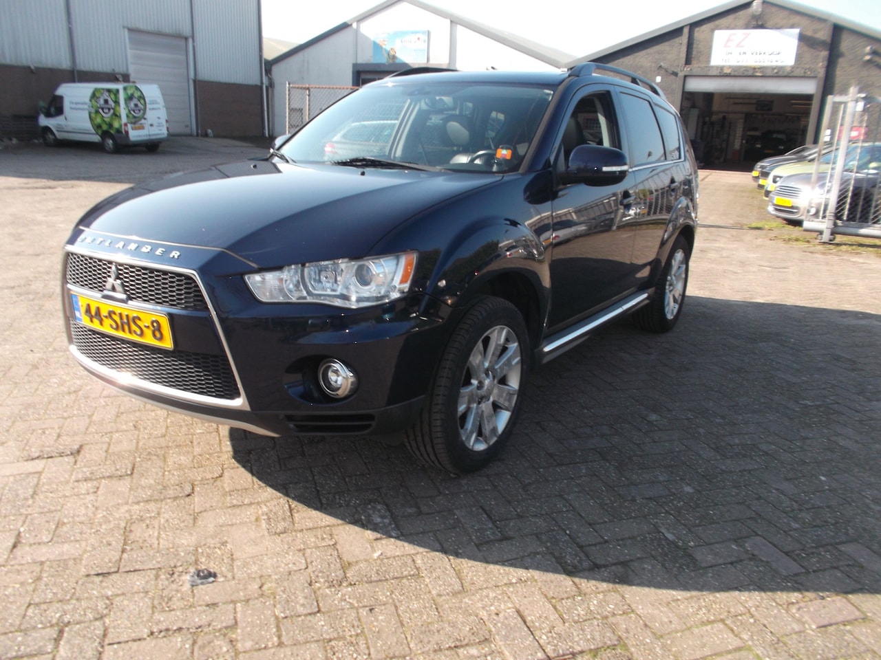 Mitsubishi Outlander - 2.0 Edition Two( katalysator defect) airco leer navi xenon afn trekhaak - AutoWereld.nl