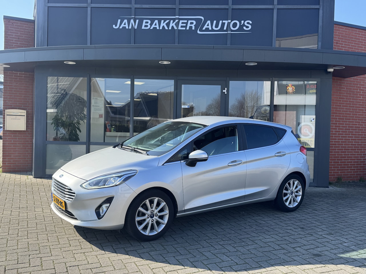 Ford Fiesta - 1.0 EcoBoost Titanium ✅ CarPlay ✅ Clima ✅ Cruisecontrol ✅ - AutoWereld.nl