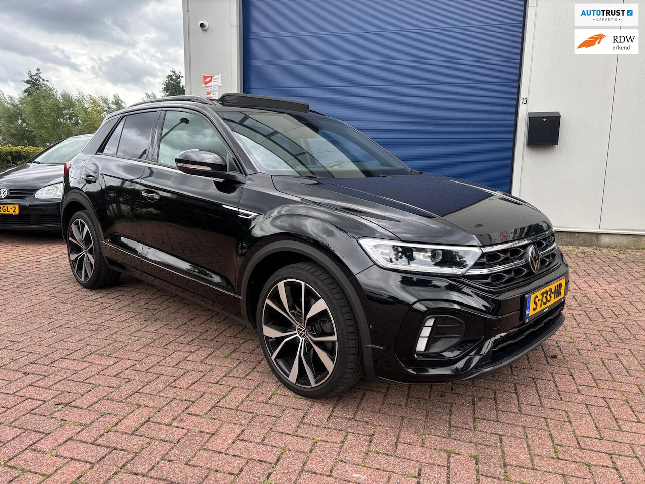 Volkswagen T-Roc - 2.0 TSI 4Motion R-Line Business+ INCL NWE APK!! - AutoWereld.nl