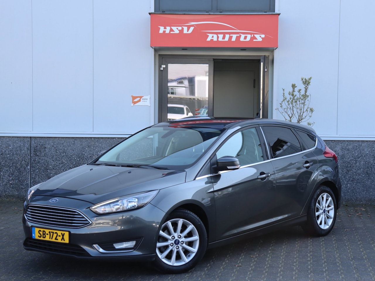 Ford Focus - 1.0 Titanium navi LM airco cruise - AutoWereld.nl