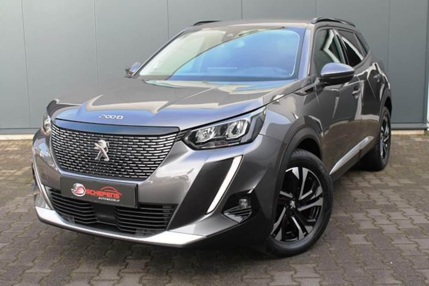 Peugeot 2008 - 1.2 PureTech Allure Road Trip | Navi | 3D Display | Camera | Trekhaak - AutoWereld.nl